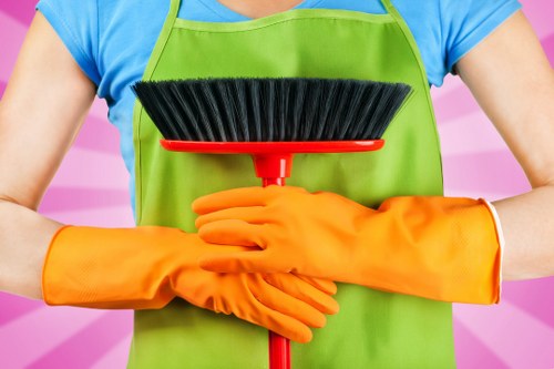 Cleaner checking a workspace for hazards