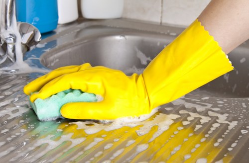Supervisor checking safe cleaning operations and waste handling