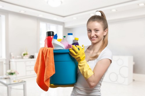 Cleaning staff using safe procedures and protective equipment
